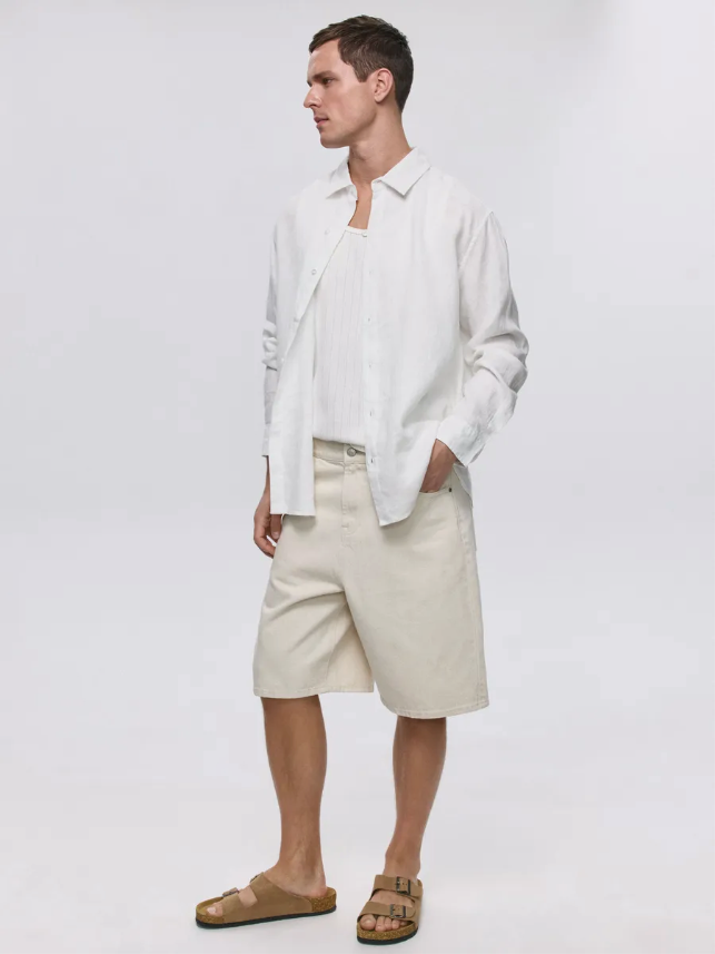 Premium men's linen shirt made from high-quality cotton fabric, offering elegance and comfort